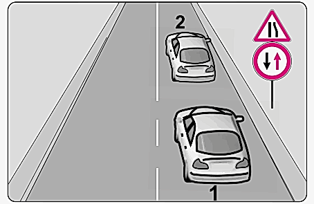 Şekildeki trafik işaretlerine göre 1 numaralı araç sürücü nasıl davranmalıdır?